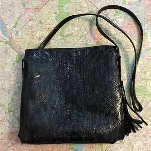 Kelly Wynne "Sorry Not Sorry' Cobra Bag